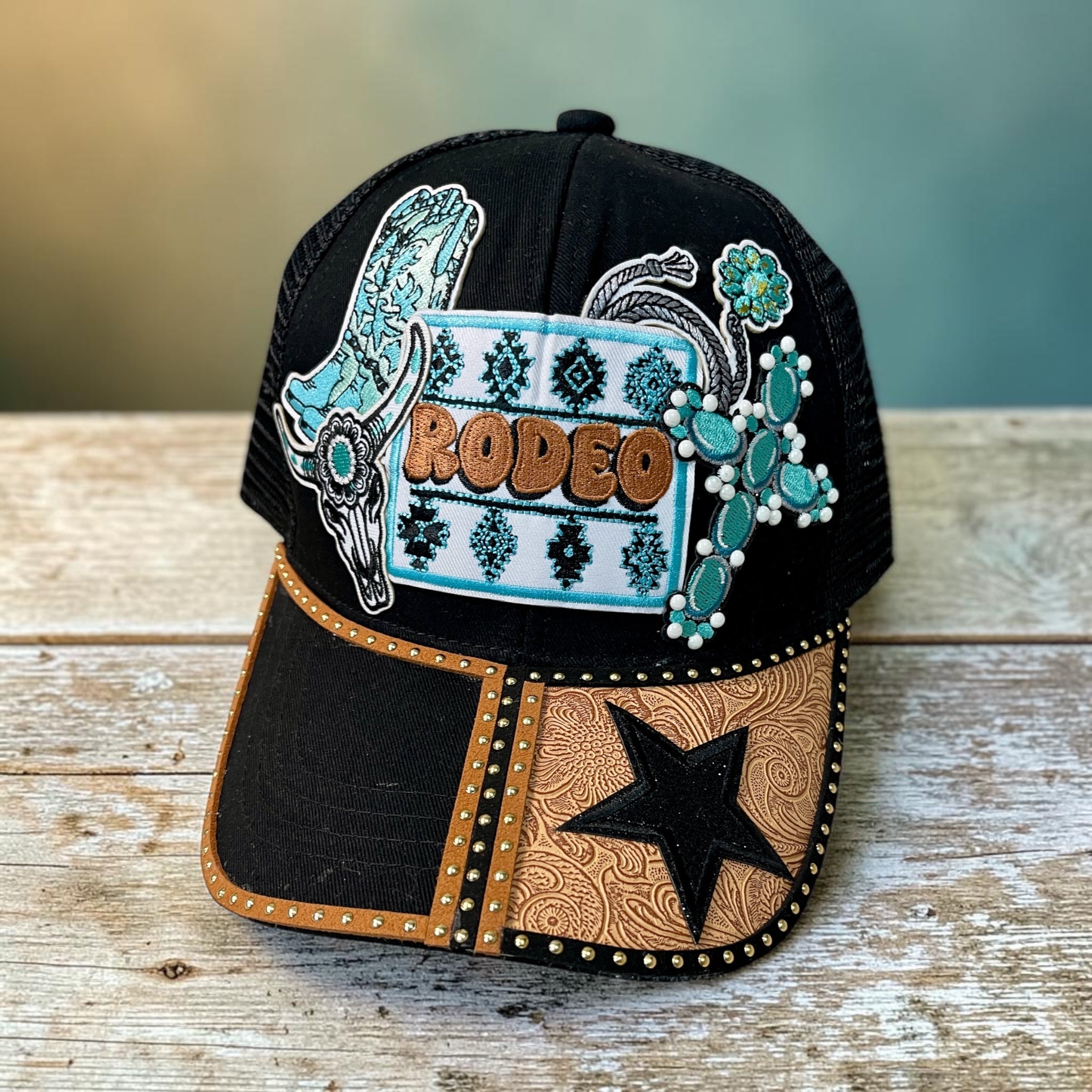 Rodeo hat by Southern Brim Works - black trucker cap with RODEO patch, turquoise cactus, bull skull, and tooled leather brim with black star